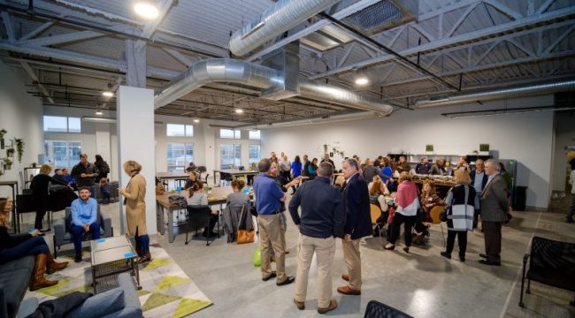 Group of people indoors for store opening