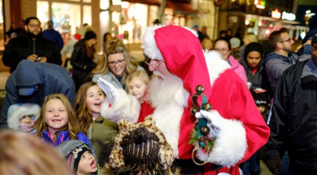 Santa waving to children