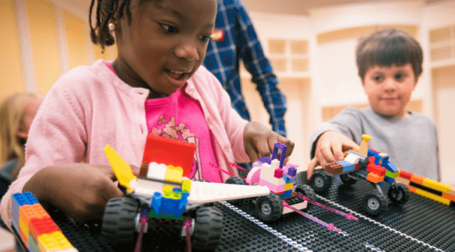 kids playing with lego cars