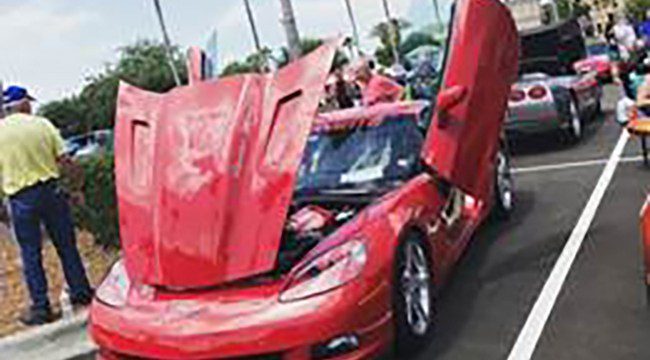 Corvette with open hood and doors