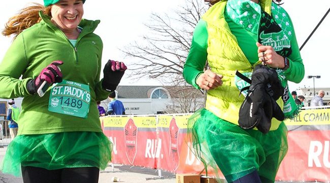 Joggers wearing green while running