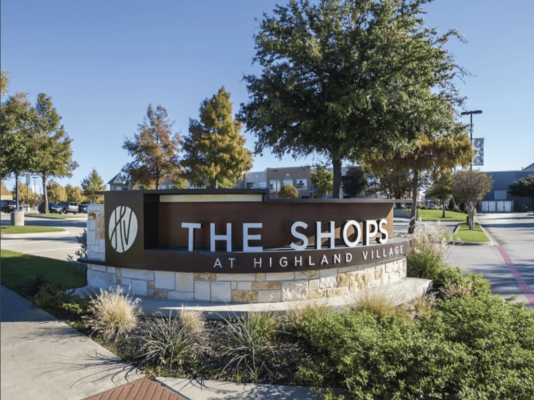 monument sign of The Shops at Highland Village